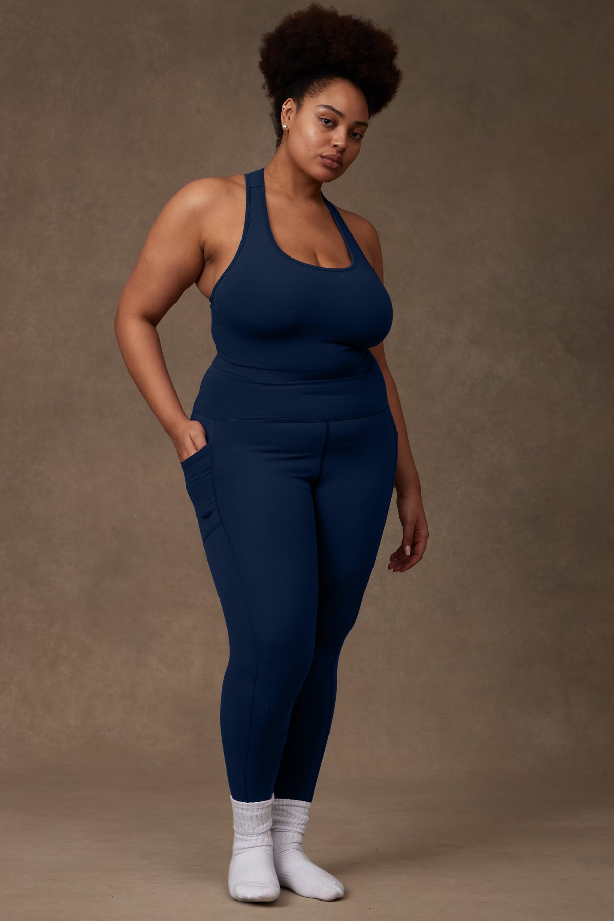 Aspen Bra styled with matching legging, on model
