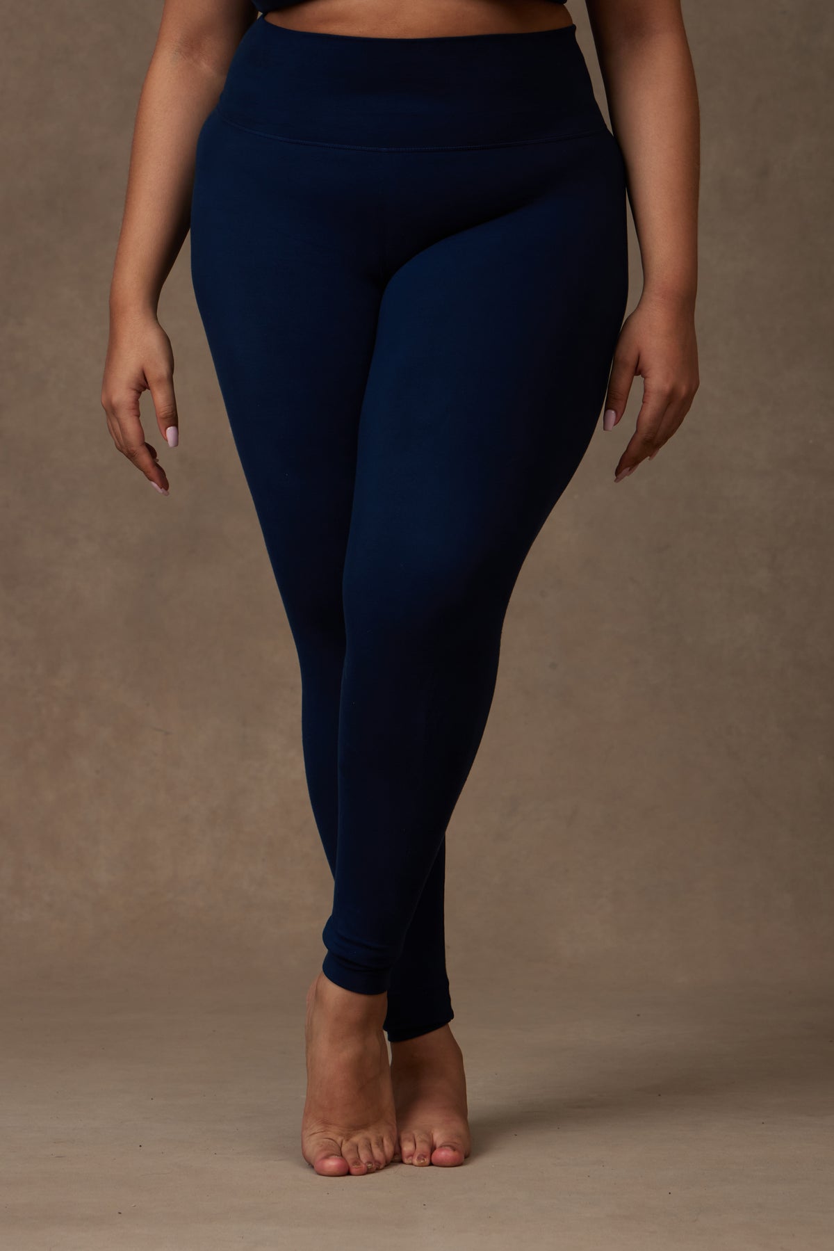 Nova Leggings in Sapphire with Stratos Bra, on model